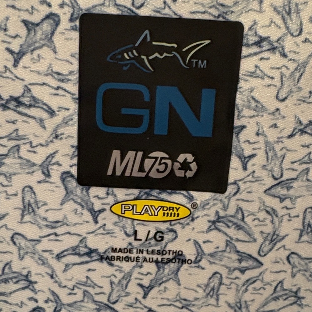 New w/tag!Greg Norman Collection White and Blue shark Patterned Polo. Size Large - Picture 3 of 7